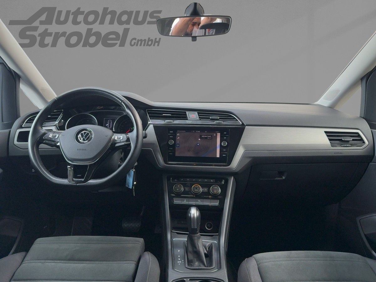 Touran 1.5 TSI DSG Comfortline 7-Sitze ACC Navi ergo Bluet. Sitzh.